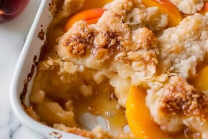 Thumbnail for Easy Peach Cobbler with Cake Mix Recipe